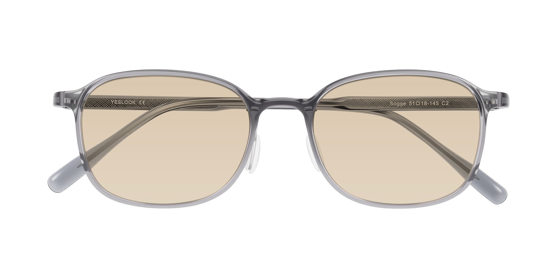 Folded Front of Sogge in Transparent Grayish Blue with Light Brown Tinted Lenses