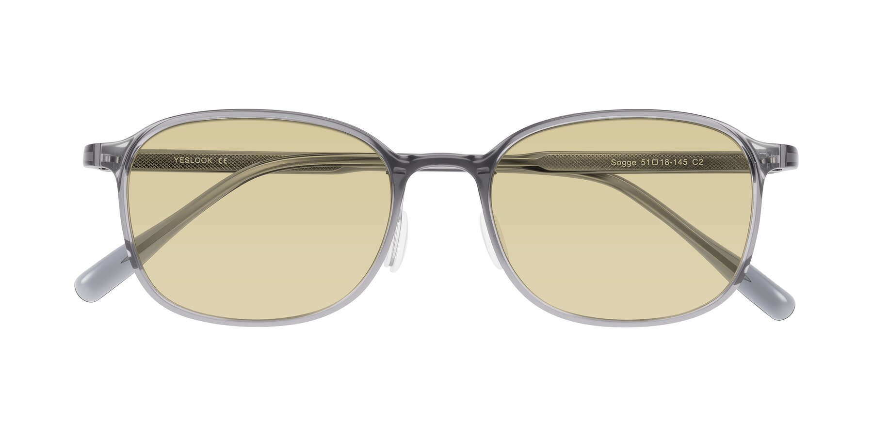 Folded Front of Sogge in Transparent Grayish Blue with Light Champagne Tinted Lenses