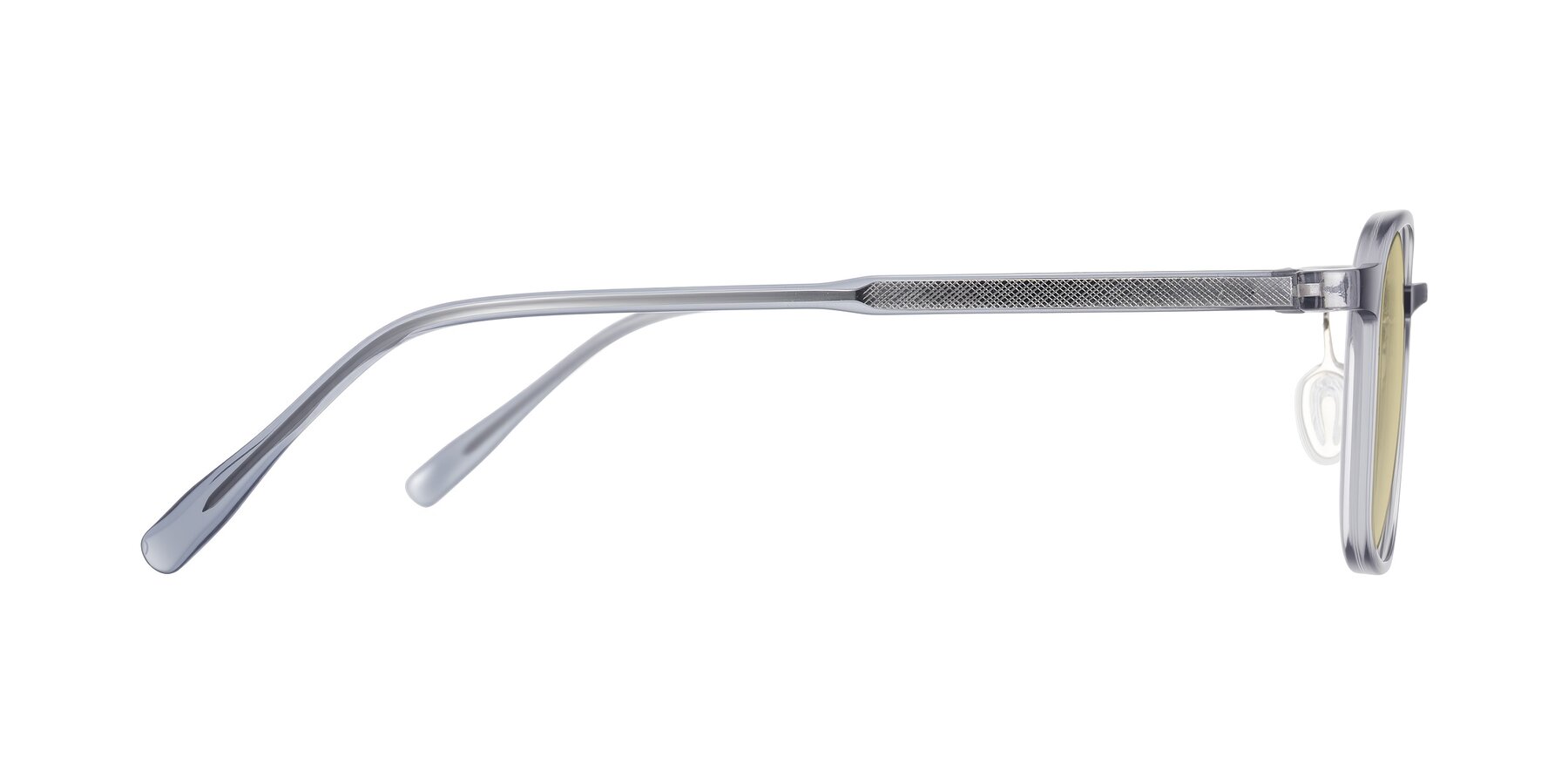 Side of Sogge in Transparent Grayish Blue with Light Champagne Tinted Lenses