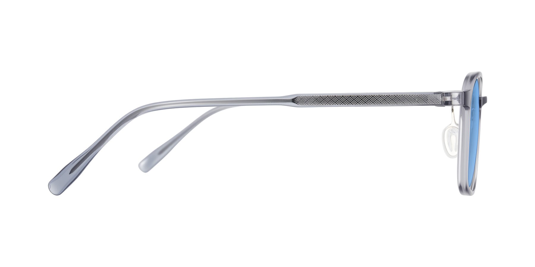 Side of Sogge in Transparent Grayish Blue with Medium Blue Tinted Lenses