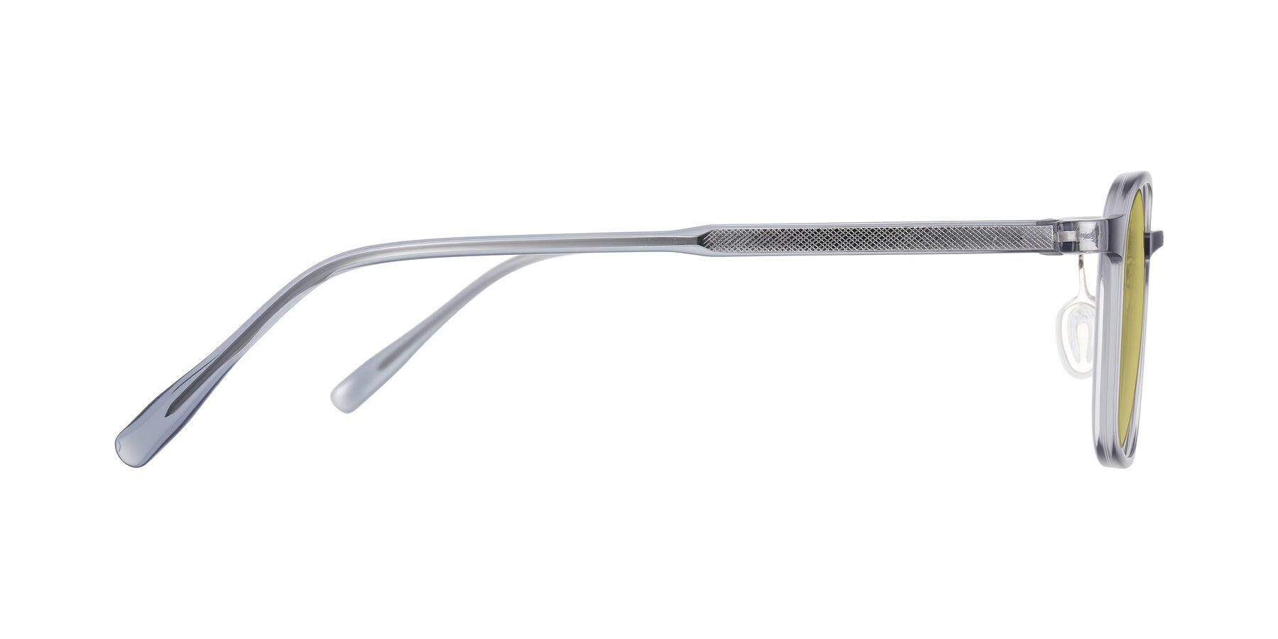 Side of Sogge in Transparent Grayish Blue with Medium Champagne Tinted Lenses