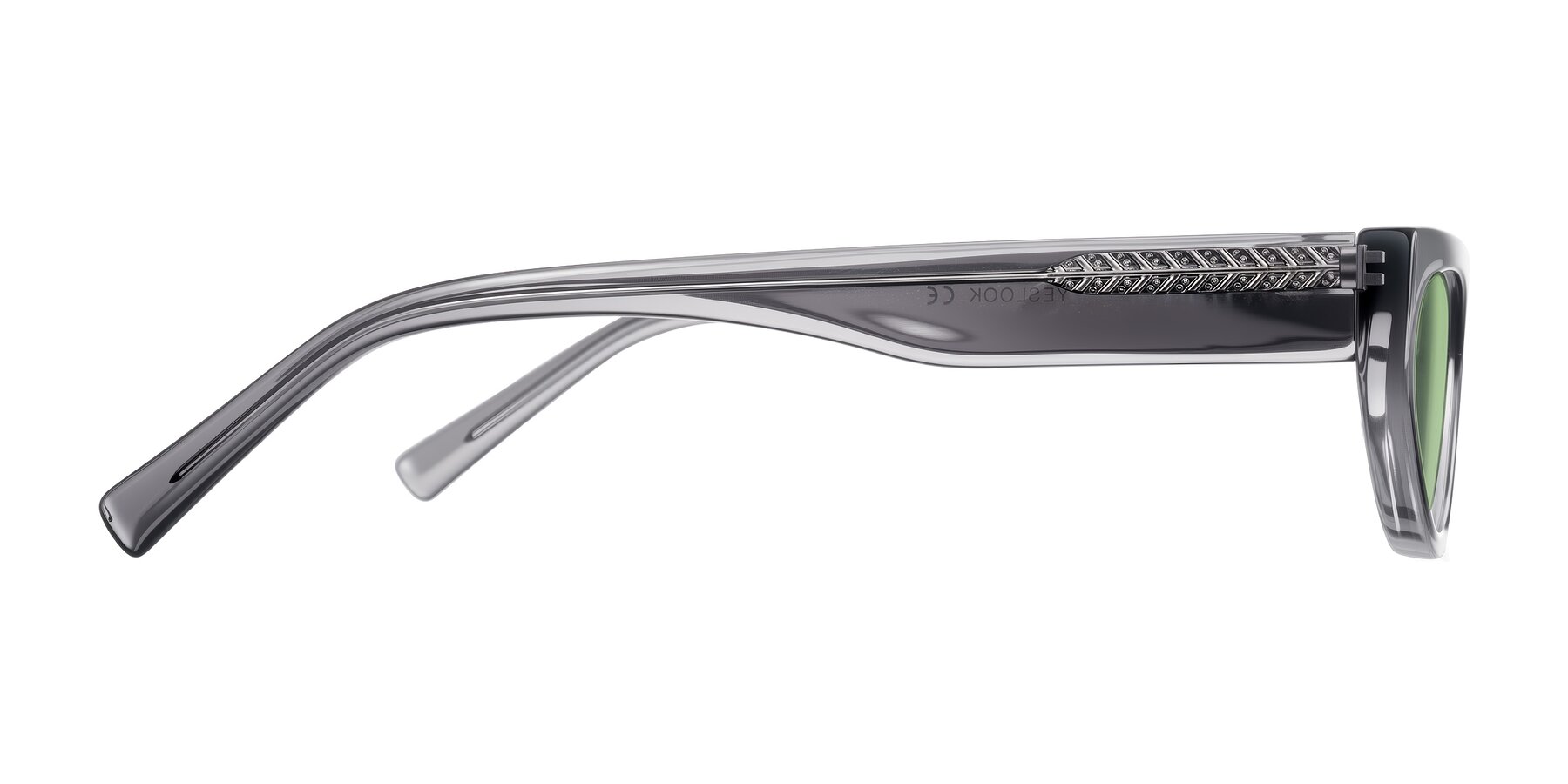 Side of Carnew in Transparent Gray with Medium Green Tinted Lenses