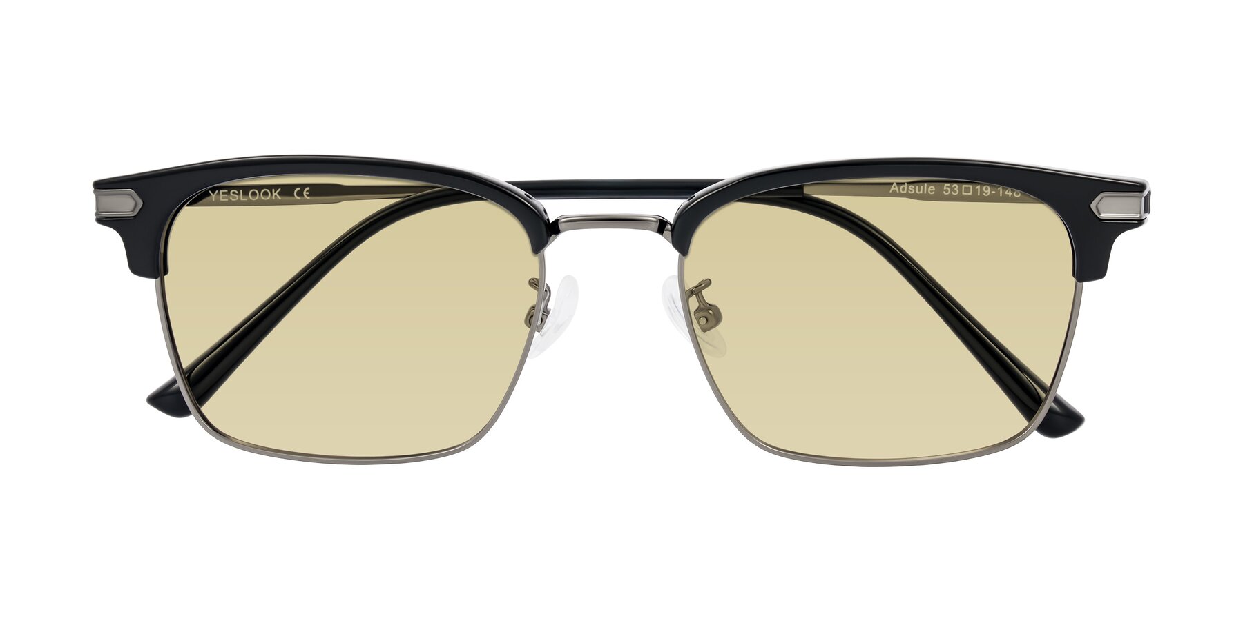 Folded Front of Adsule in Black/Gunmetal with Light Champagne Tinted Lenses