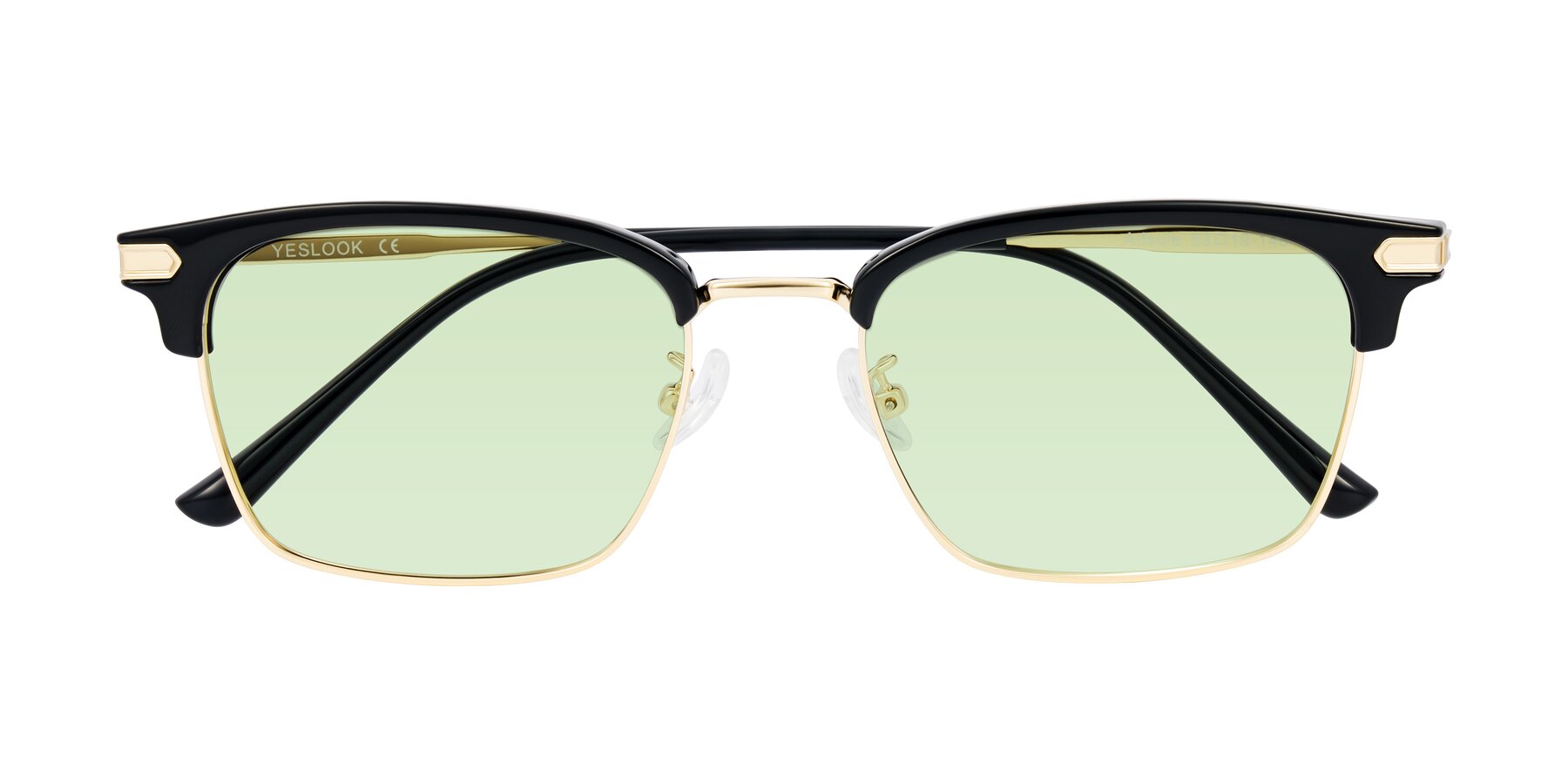 Folded Front of Adsule in Black/Gold with Light Green Tinted Lenses