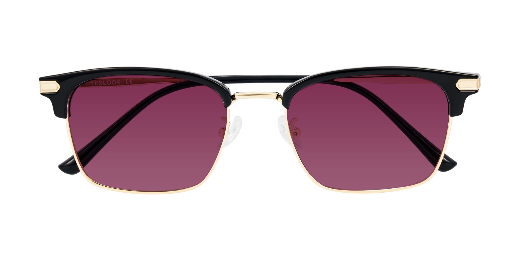 Folded Front of Adsule in Black/Gold with Wine Tinted Lenses