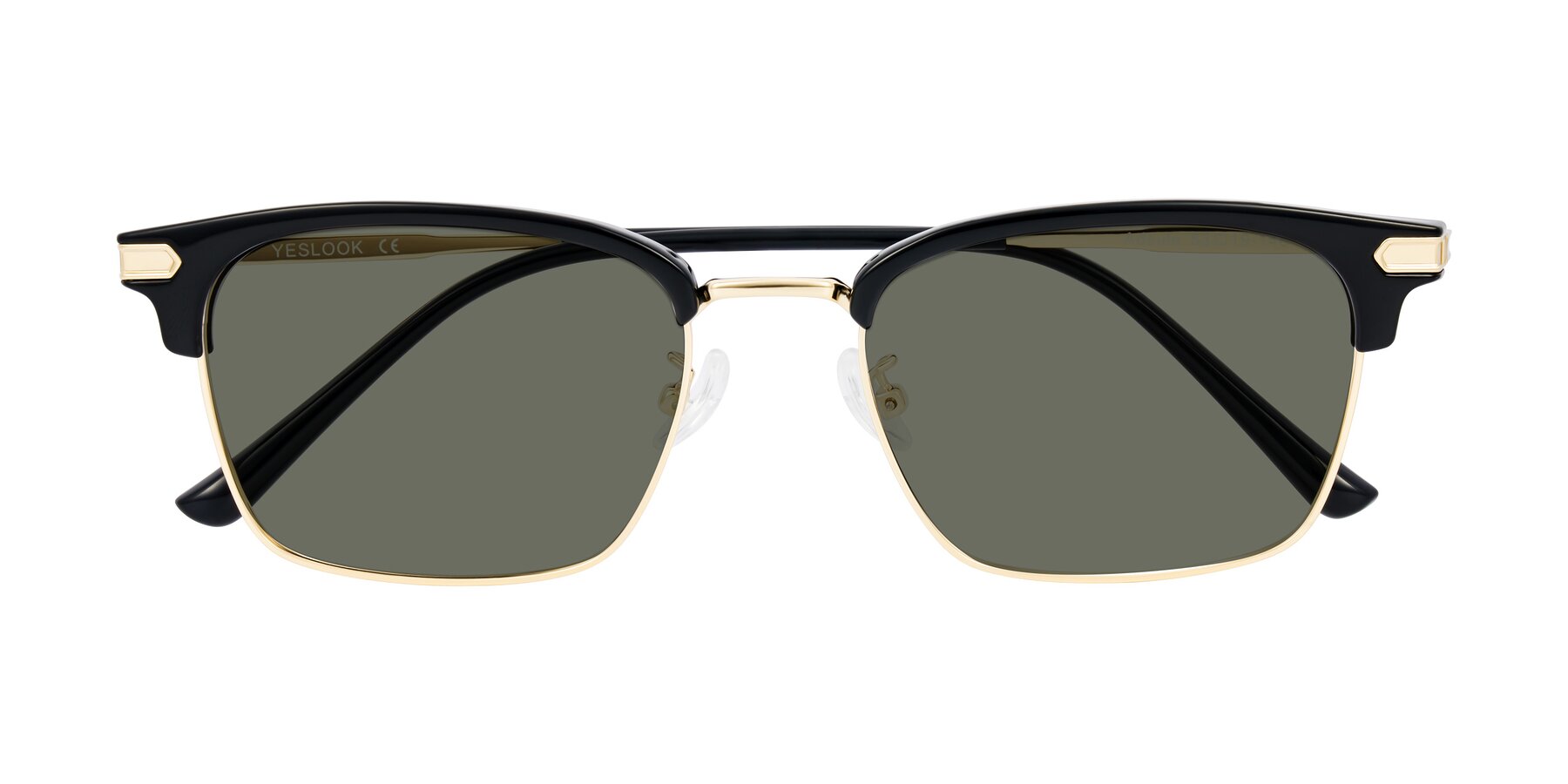 Folded Front of Adsule in Black/Gold with Gray Polarized Lenses
