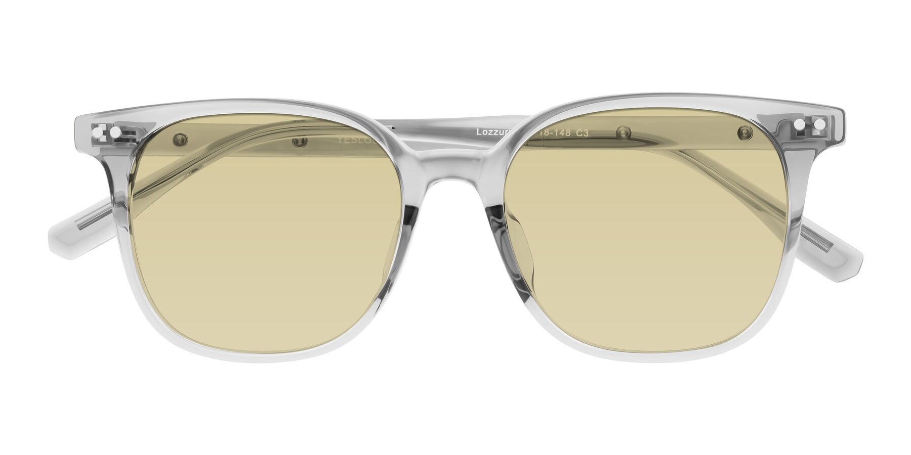 Folded Front of Lozzuri in Transparent Gray with Light Champagne Tinted Lenses