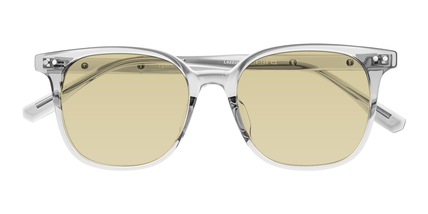 Folded Front of Lozzuri in Transparent Gray with Light Champagne Tinted Lenses