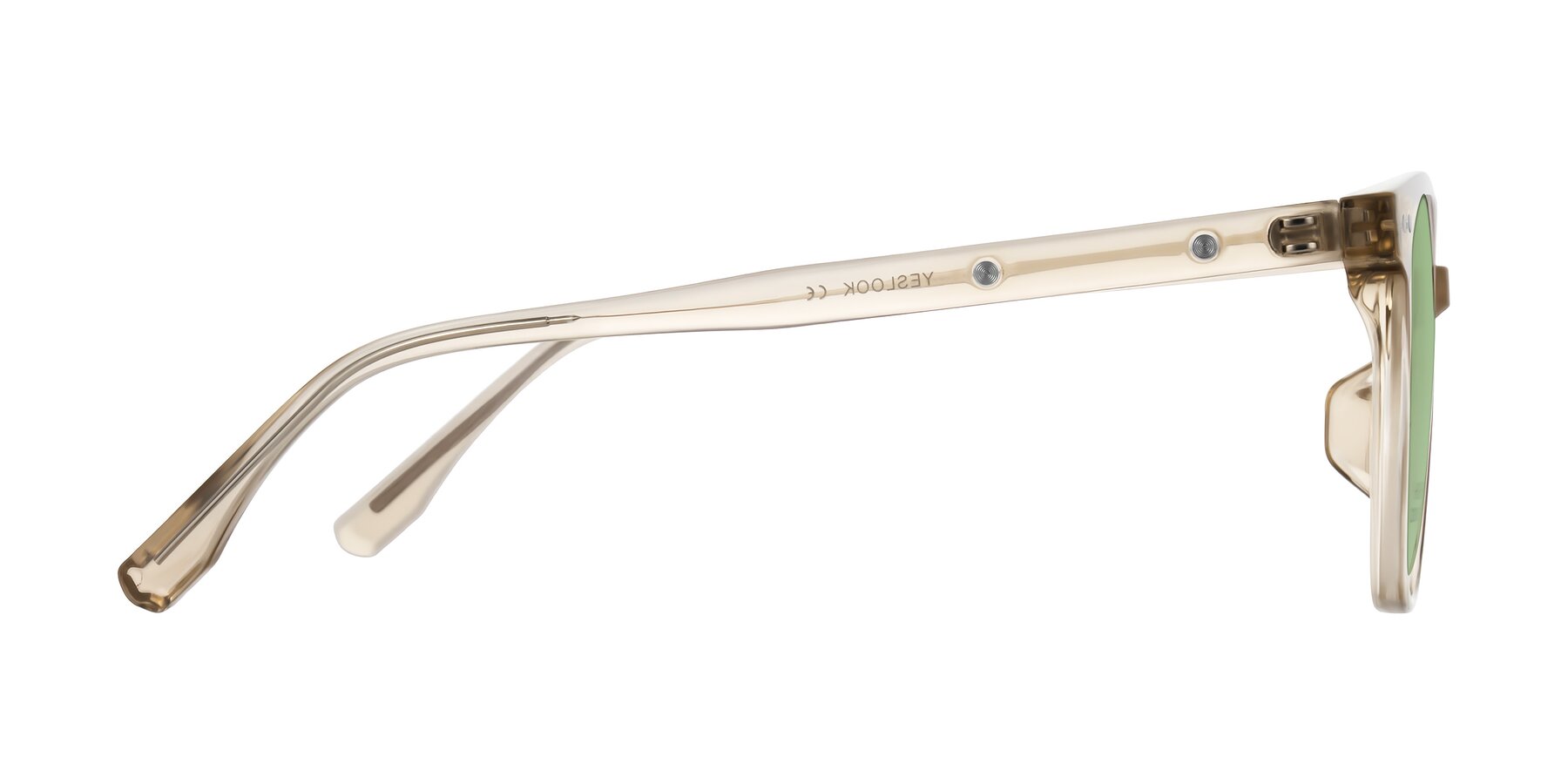 Side of Lozzuri in Transparent Champagne with Medium Green Tinted Lenses