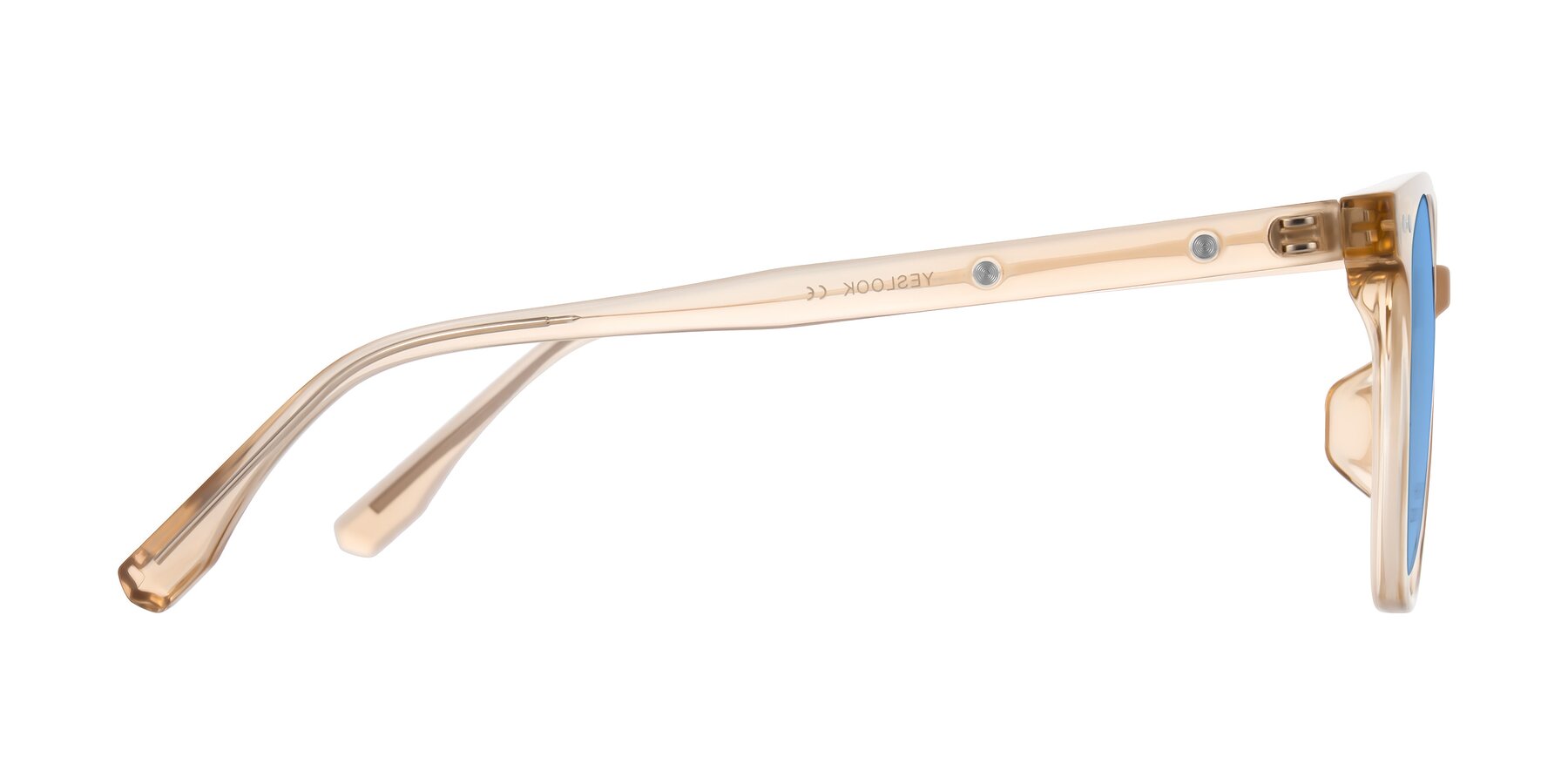 Side of Lozzuri in Transparent Champagne with Medium Blue Tinted Lenses