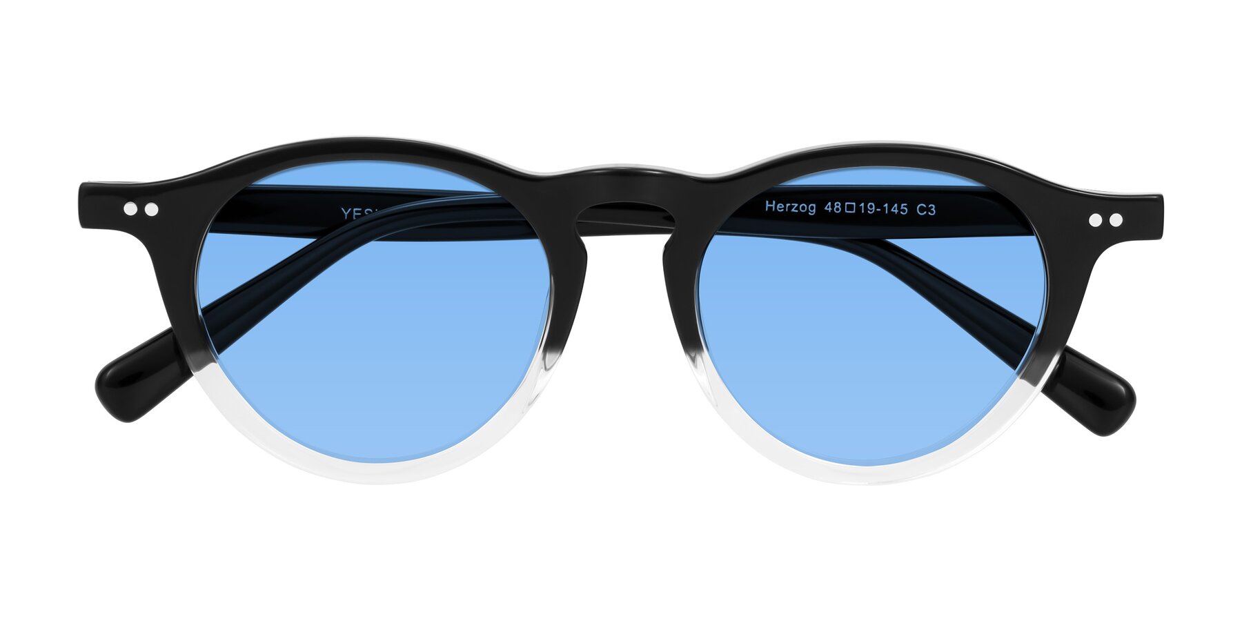 Folded Front of Herzog in Black/Clear with Medium Blue Tinted Lenses