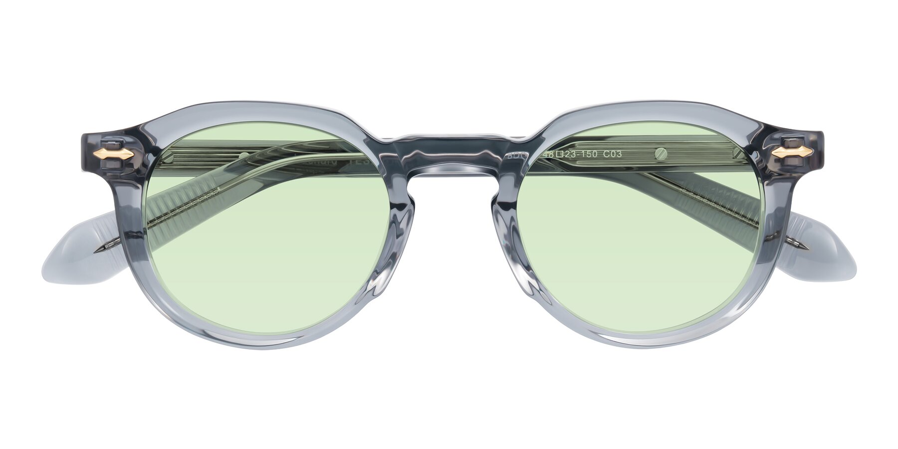Folded Front of Lachard in Crystal Dusty Blue with Light Green Tinted Lenses