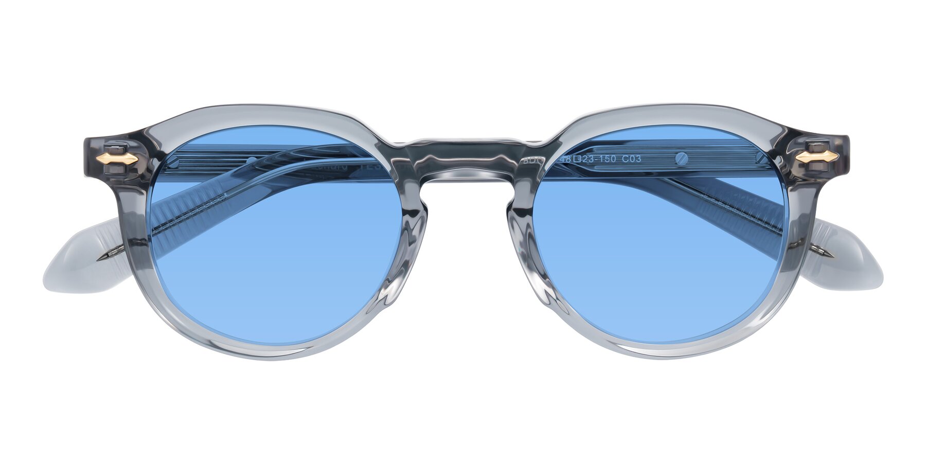Folded Front of Lachard in Crystal Dusty Blue with Medium Blue Tinted Lenses