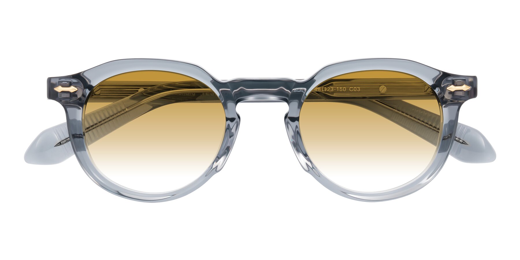 Folded Front of Lachard in Crystal Dusty Blue with Champagne Gradient Lenses