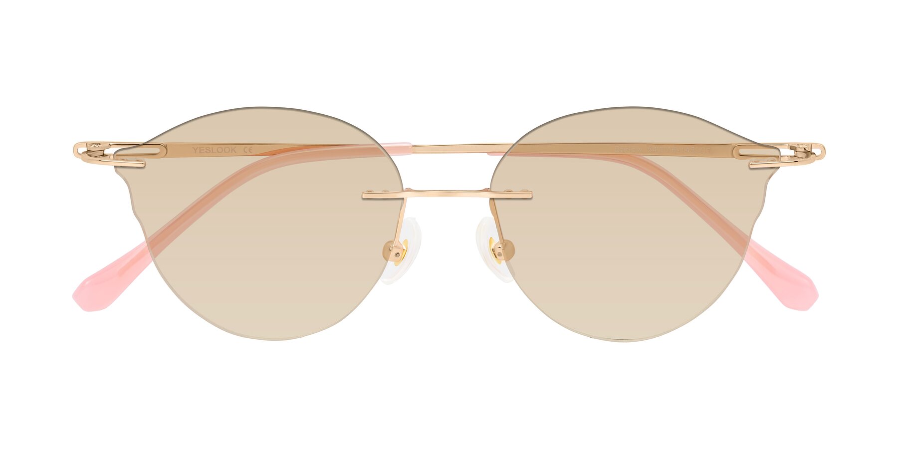 Folded Front of Barlow in Rose Gold/Pink with Light Brown Tinted Lenses