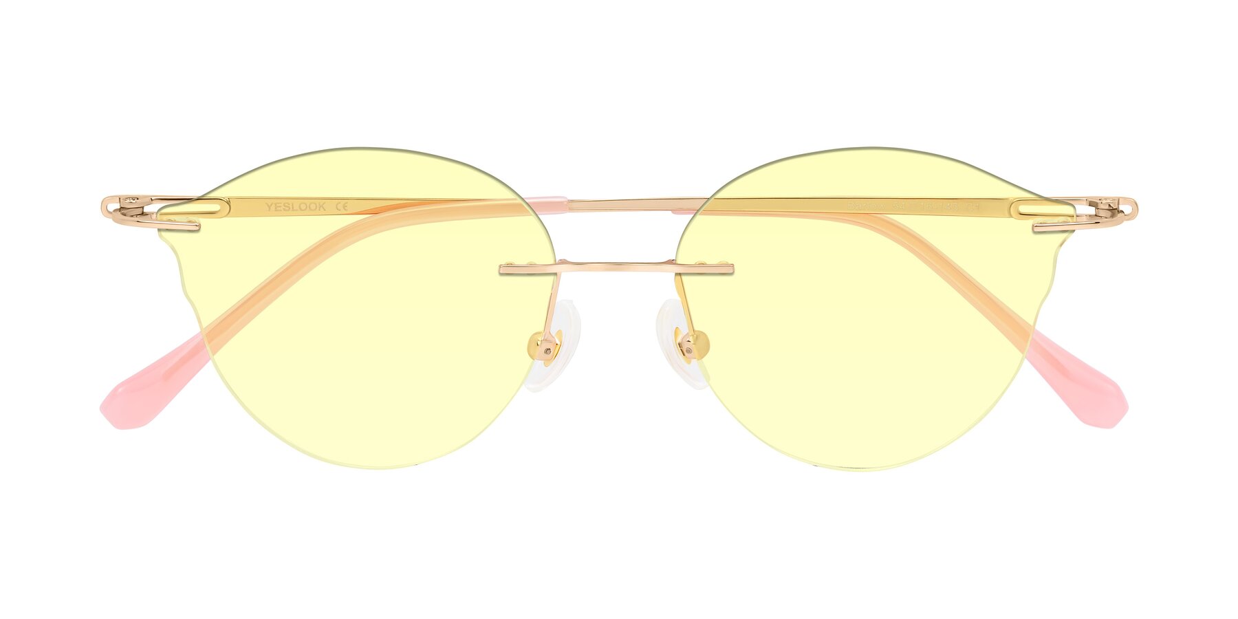 Folded Front of Barlow in Rose Gold/Pink with Light Yellow Tinted Lenses