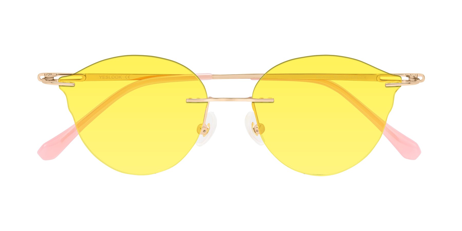 Folded Front of Barlow in Rose Gold/Pink with Medium Yellow Tinted Lenses