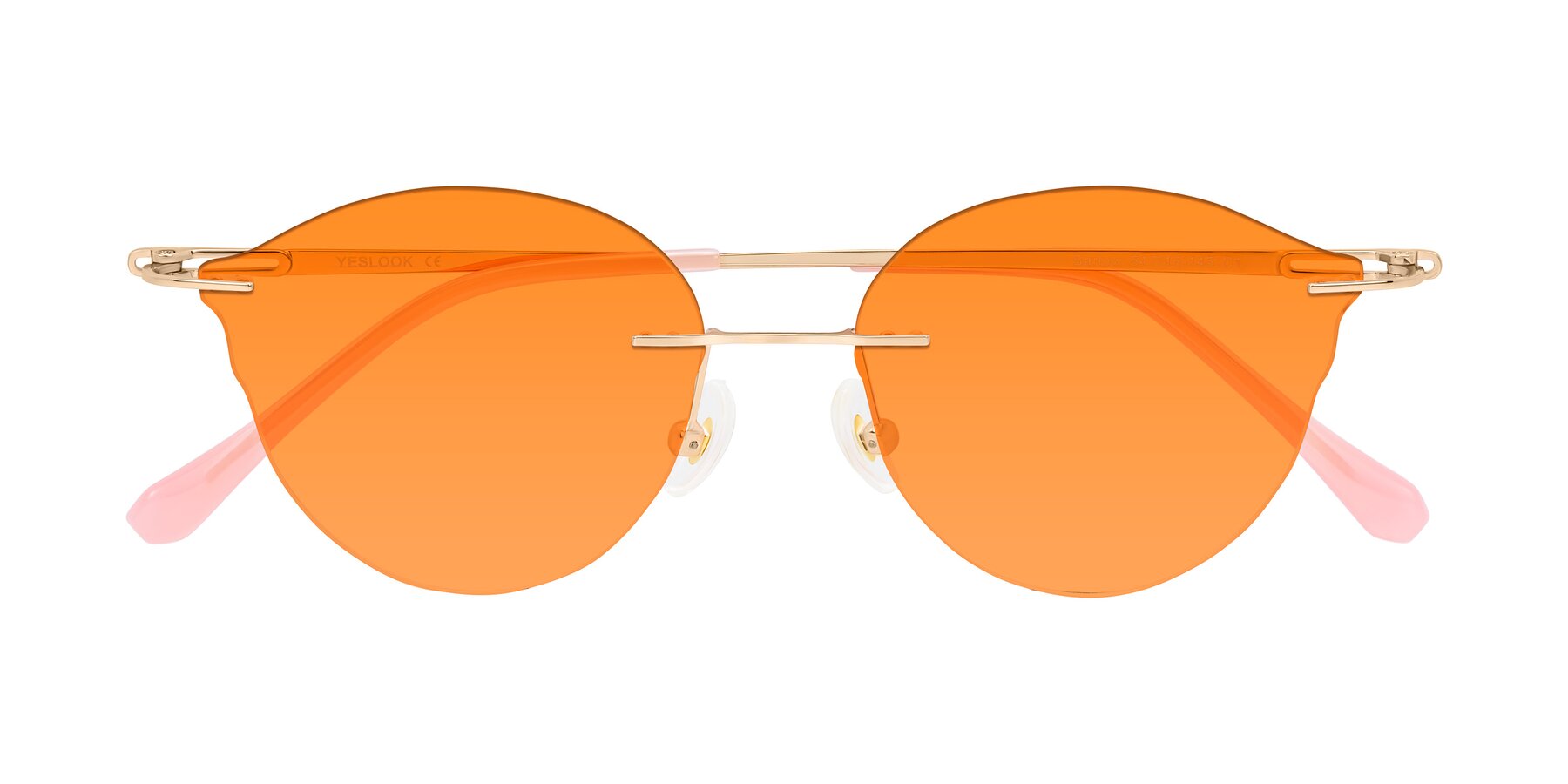 Folded Front of Barlow in Rose Gold/Pink with Orange Tinted Lenses