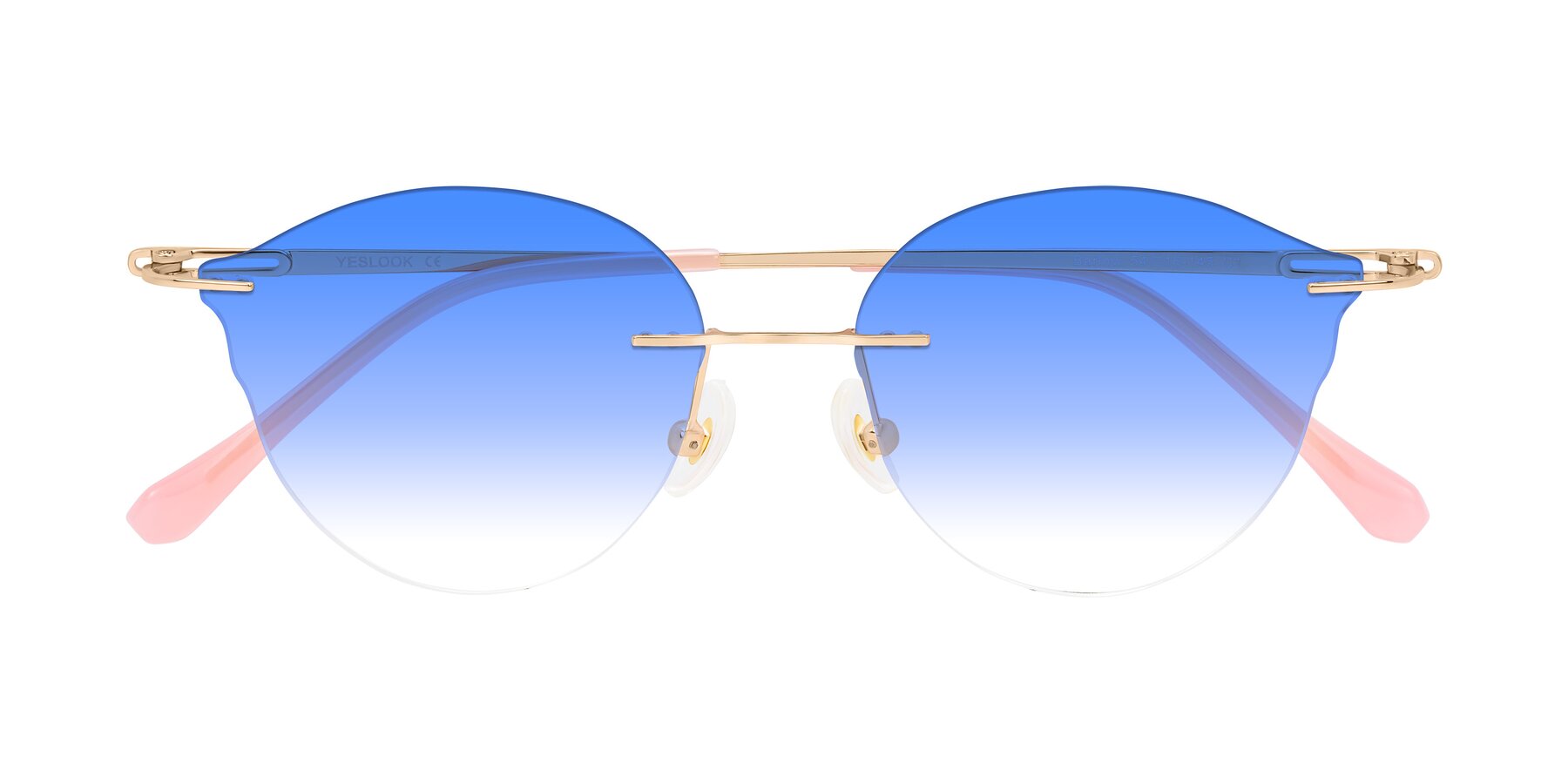 Folded Front of Barlow in Rose Gold/Pink with Blue Gradient Lenses