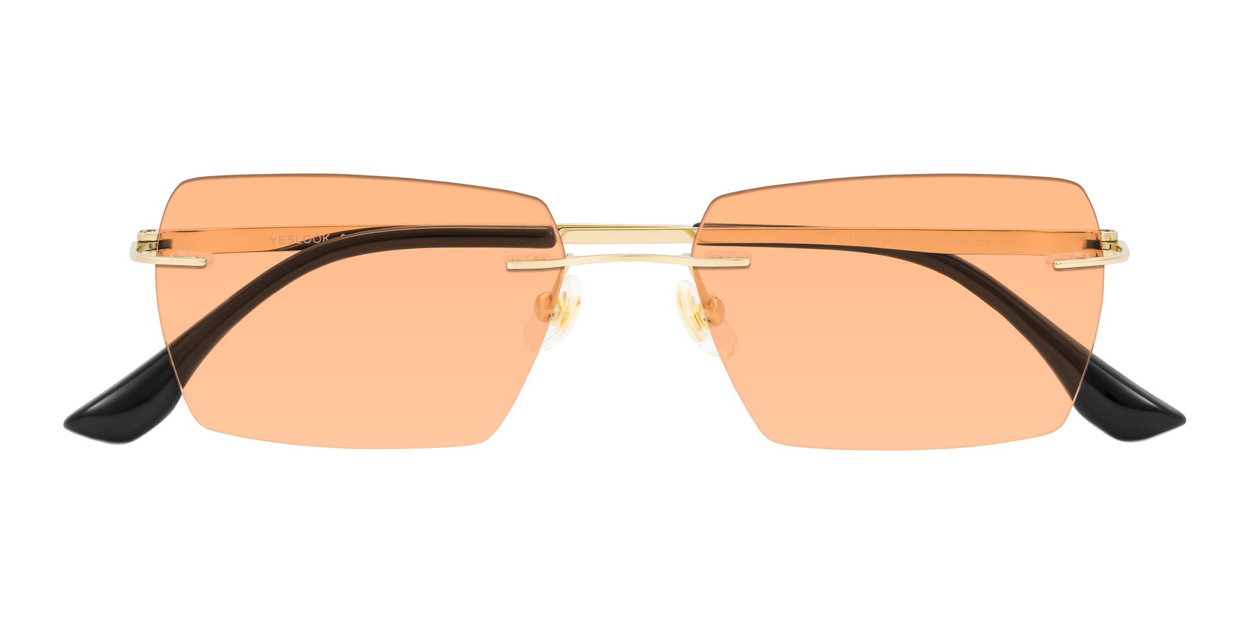 Folded Front of Tranquil in Gold with Light Orange Tinted Lenses