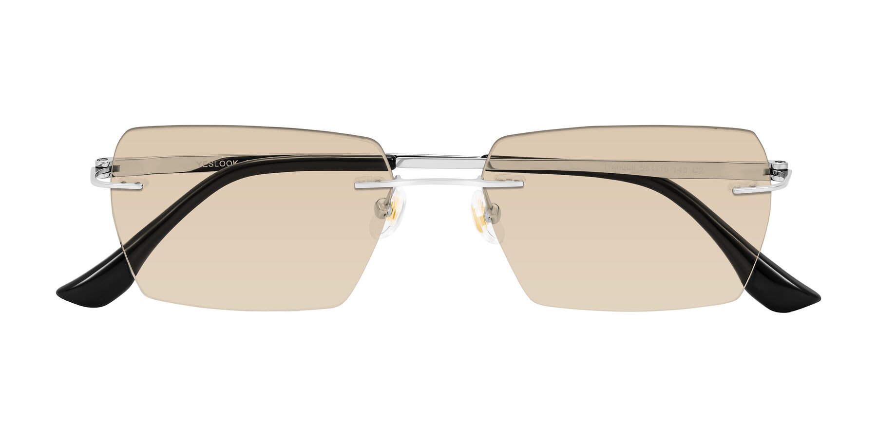 Folded Front of Tranquil in Silver with Light Brown Tinted Lenses