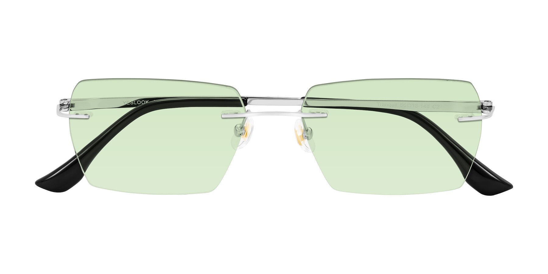 Folded Front of Tranquil in Silver with Light Green Tinted Lenses