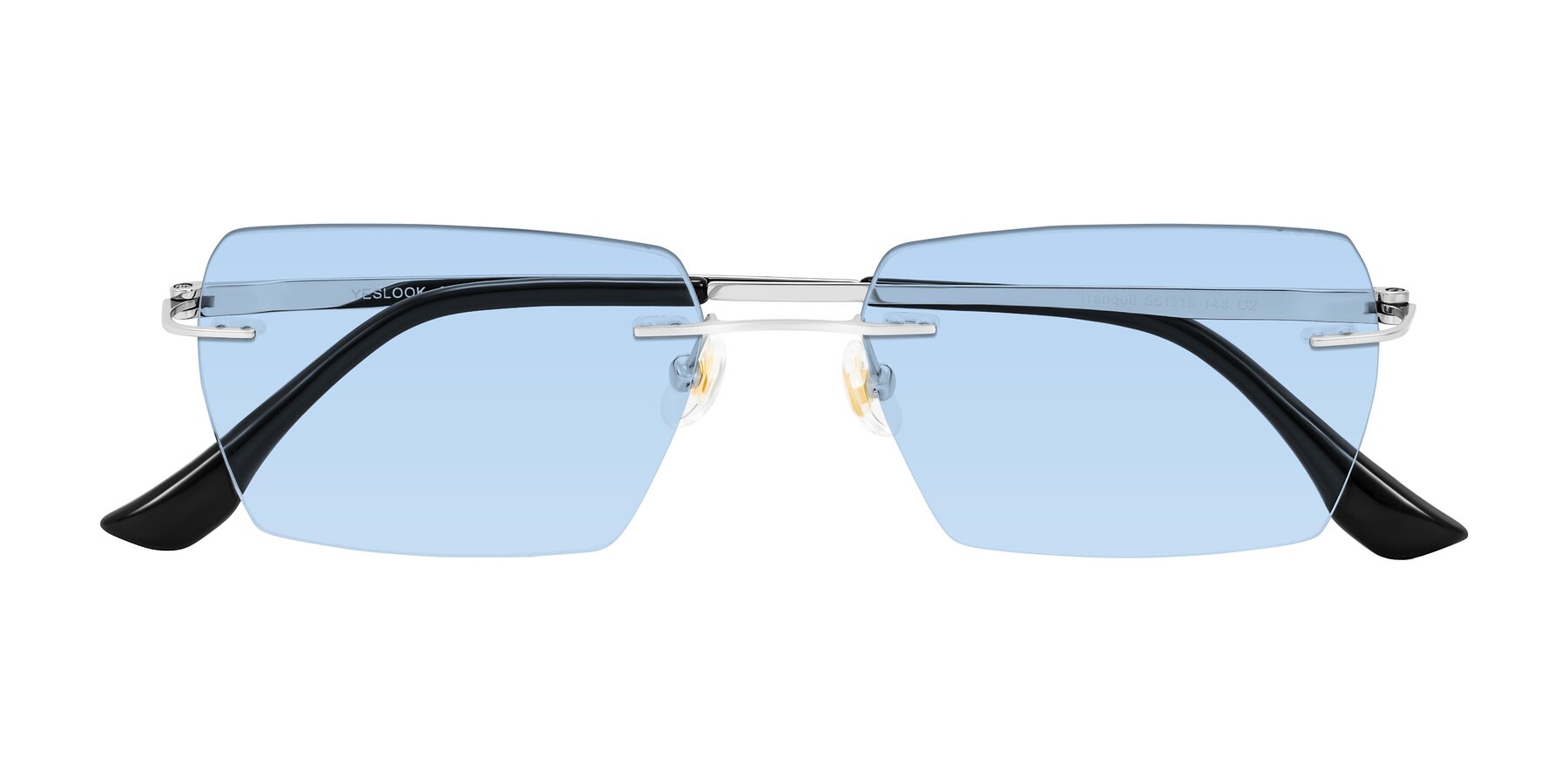 Folded Front of Tranquil in Silver with Light Blue Tinted Lenses