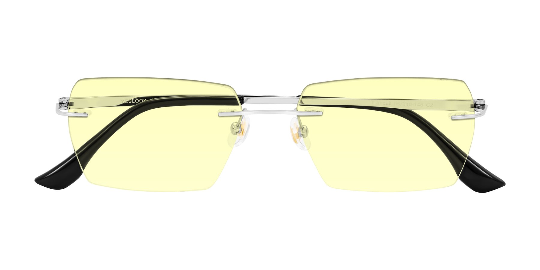 Folded Front of Tranquil in Silver with Light Yellow Tinted Lenses