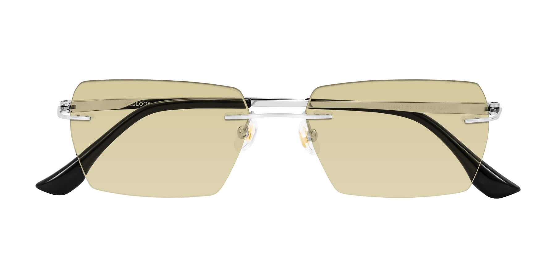 Folded Front of Tranquil in Silver with Light Champagne Tinted Lenses