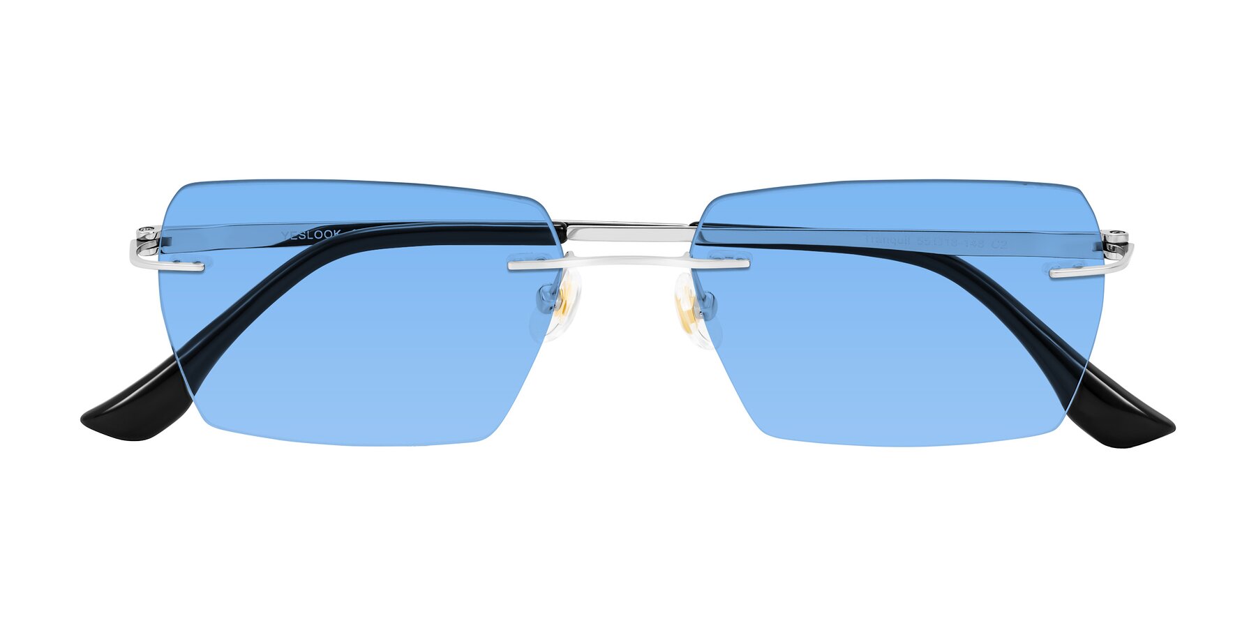 Folded Front of Tranquil in Silver with Medium Blue Tinted Lenses