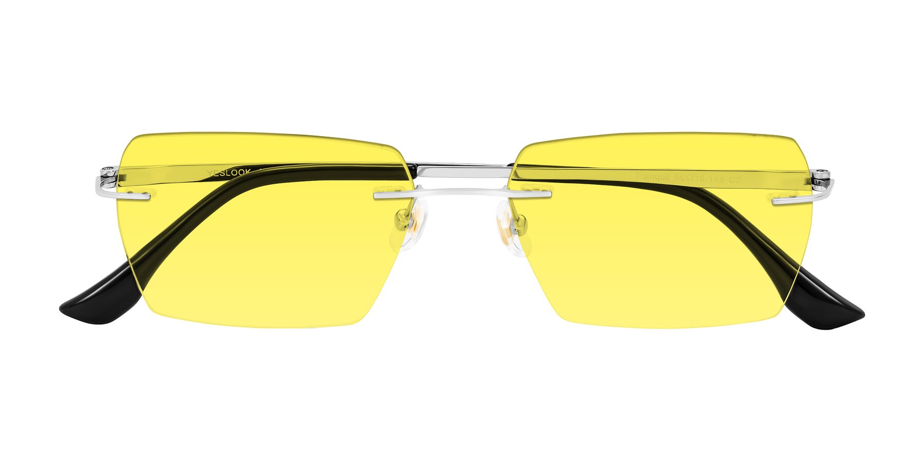 Folded Front of Tranquil in Silver with Medium Yellow Tinted Lenses