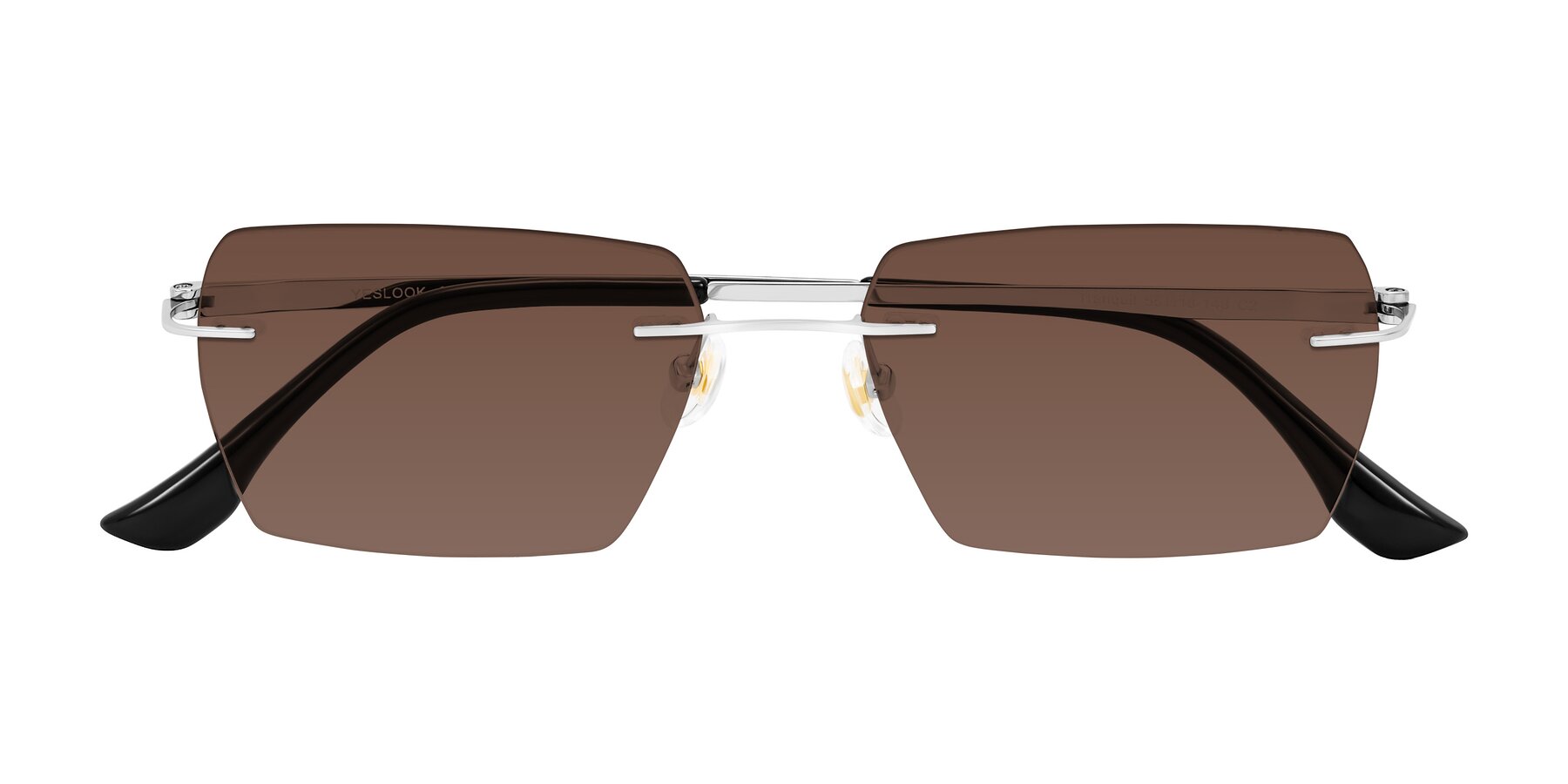 Folded Front of Tranquil in Silver with Brown Tinted Lenses