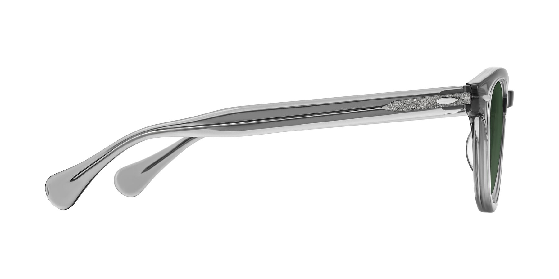Side of Estean in Transparent Gray with Green Tinted Lenses