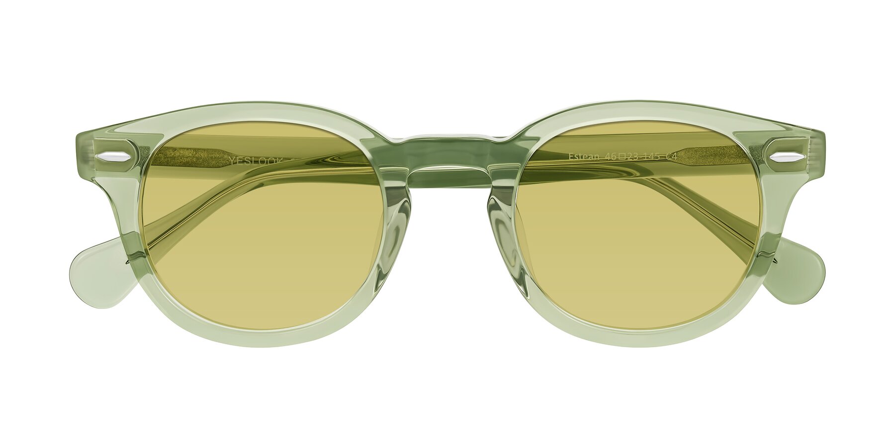 Folded Front of Estean in Transparent Green with Medium Champagne Tinted Lenses