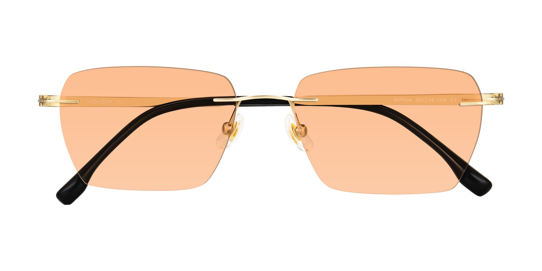 Folded Front of Airflow in Gold with Light Orange Tinted Lenses