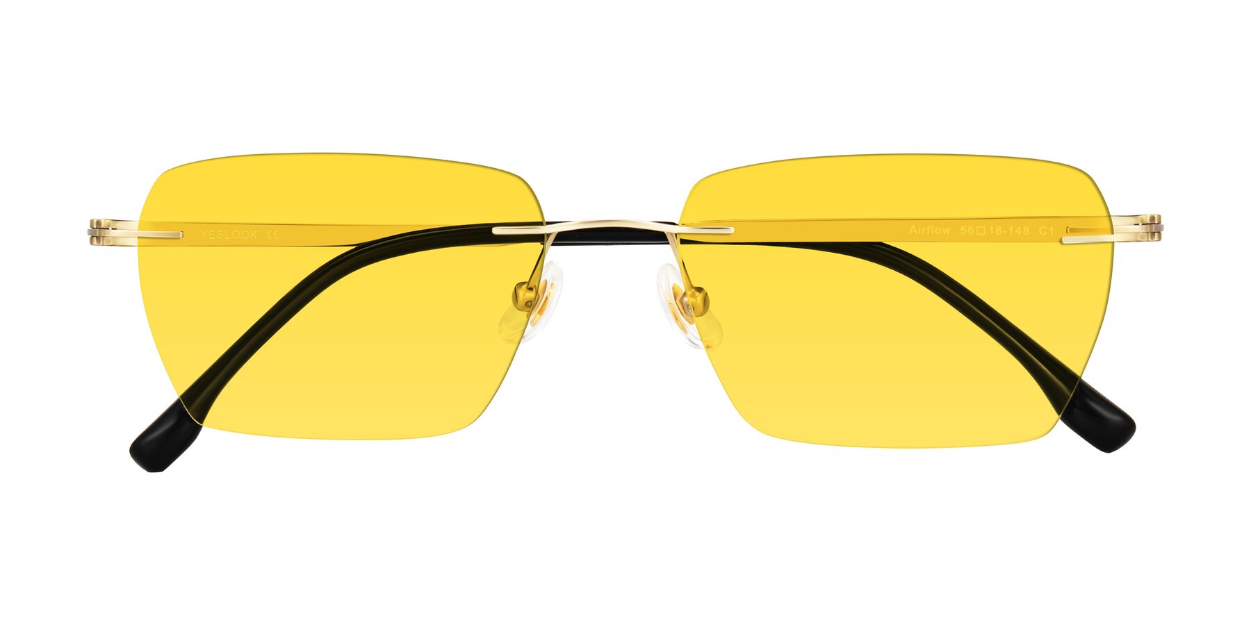 Folded Front of Airflow in Gold with Yellow Tinted Lenses