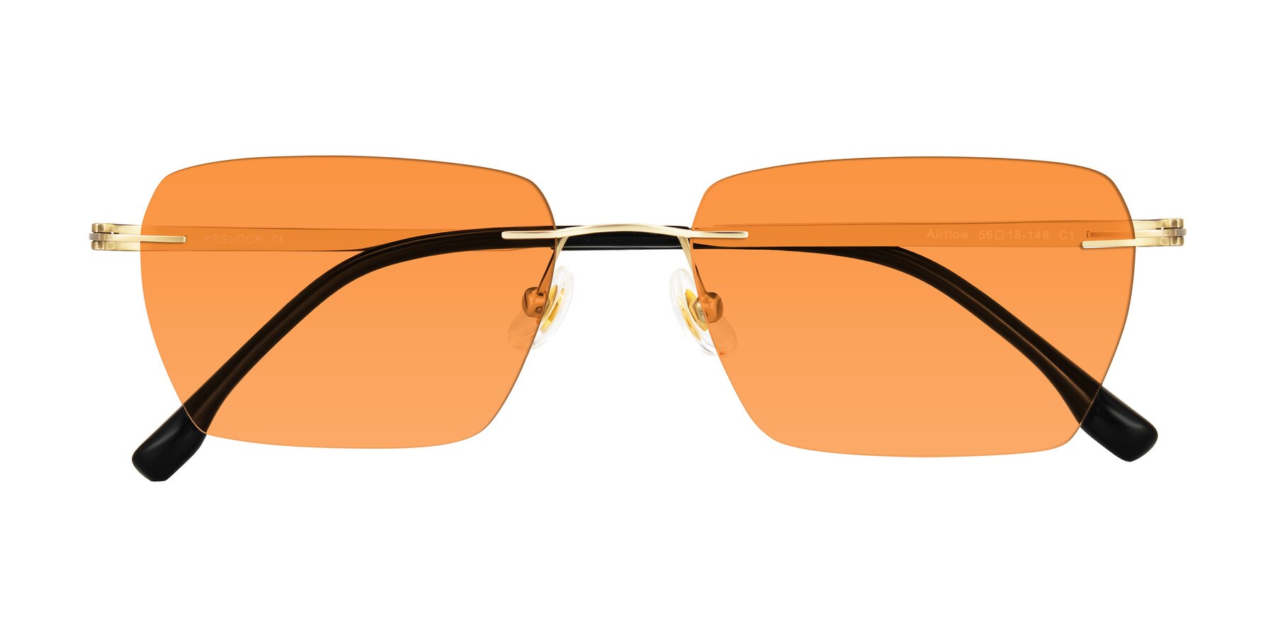 Folded Front of Airflow in Gold with Orange Tinted Lenses