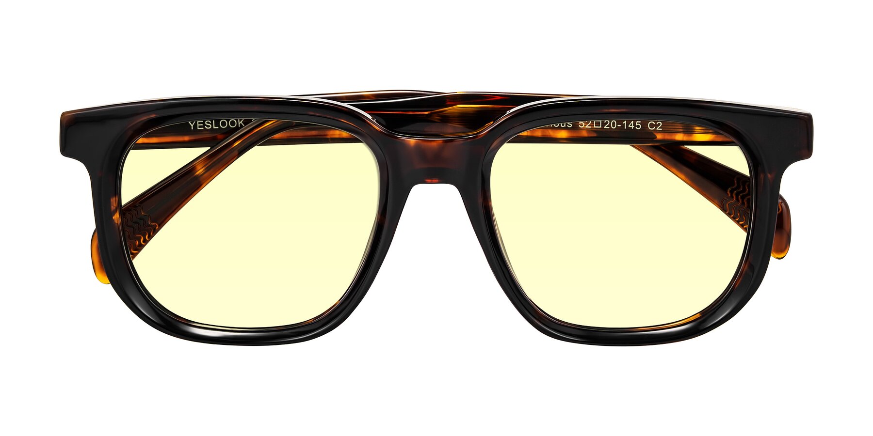 Folded Front of Mysterious in Dark Tortoise with Light Yellow Tinted Lenses