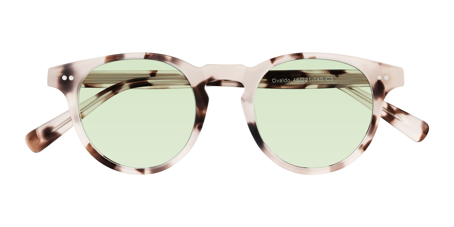 Folded Front of Ovaldo in Ivory Tortoise with Light Green Tinted Lenses