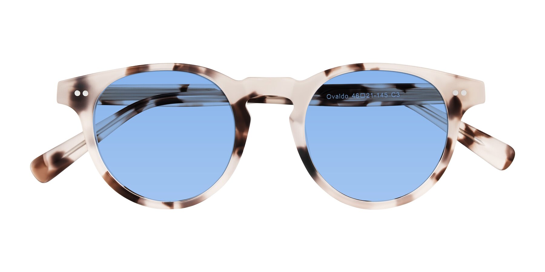 Folded Front of Ovaldo in Ivory Tortoise with Medium Blue Tinted Lenses