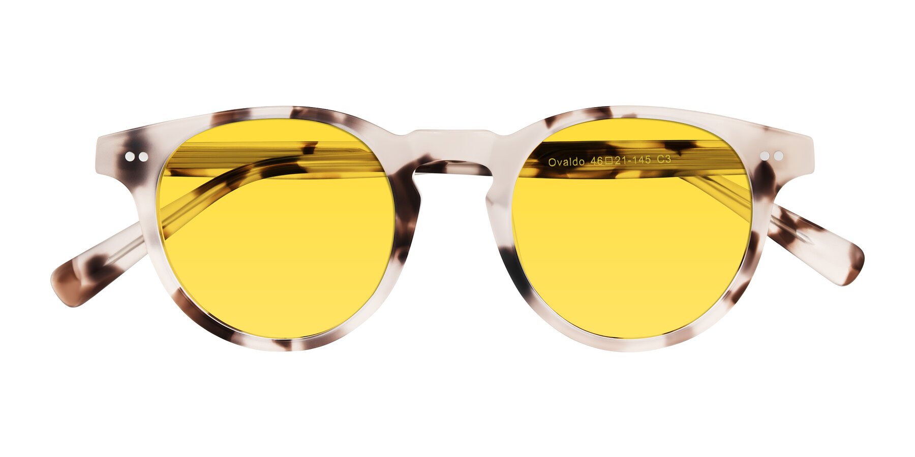 Folded Front of Ovaldo in Ivory Tortoise with Yellow Tinted Lenses