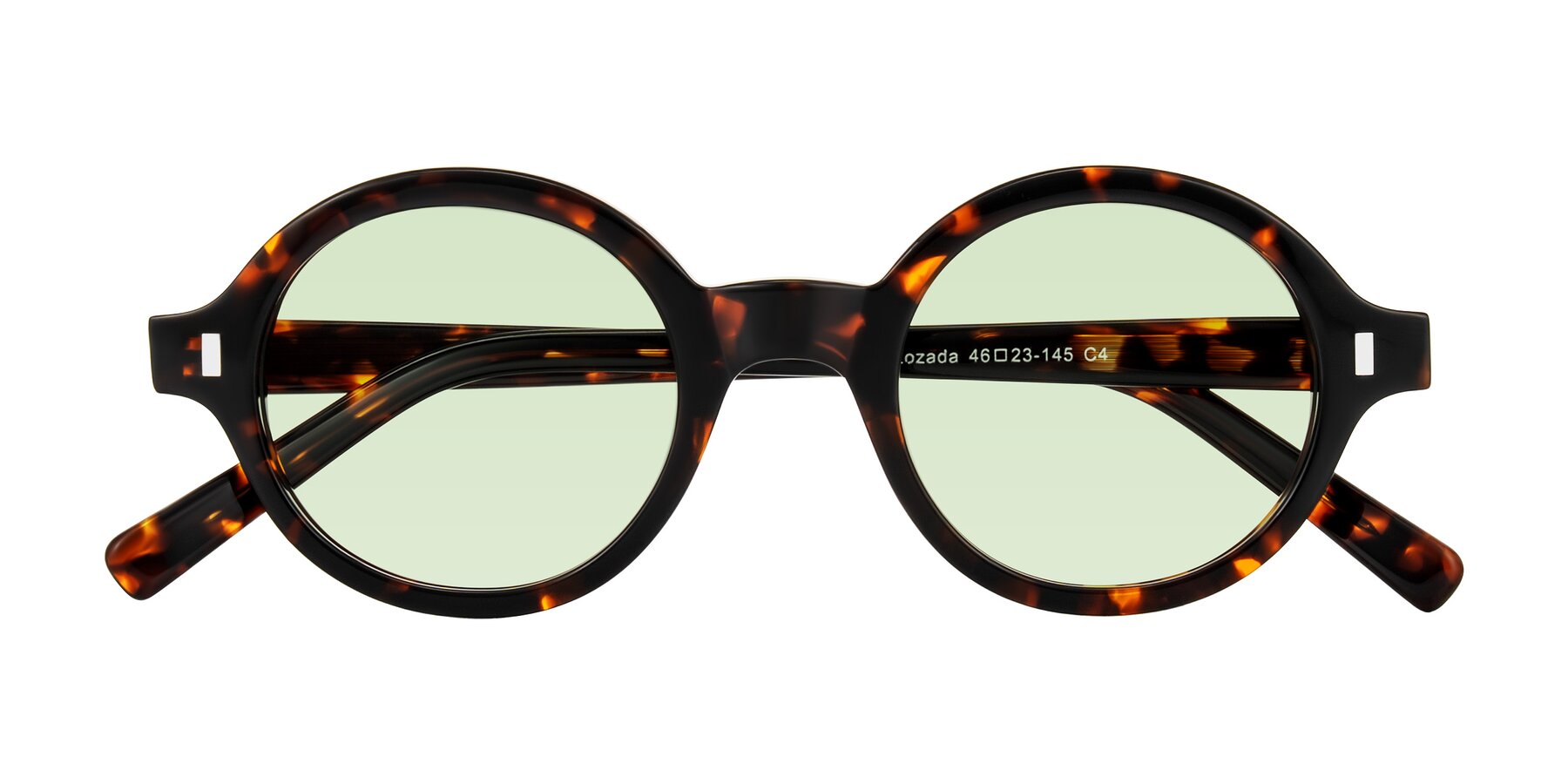 Folded Front of Lozada in Tortoise with Light Green Tinted Lenses
