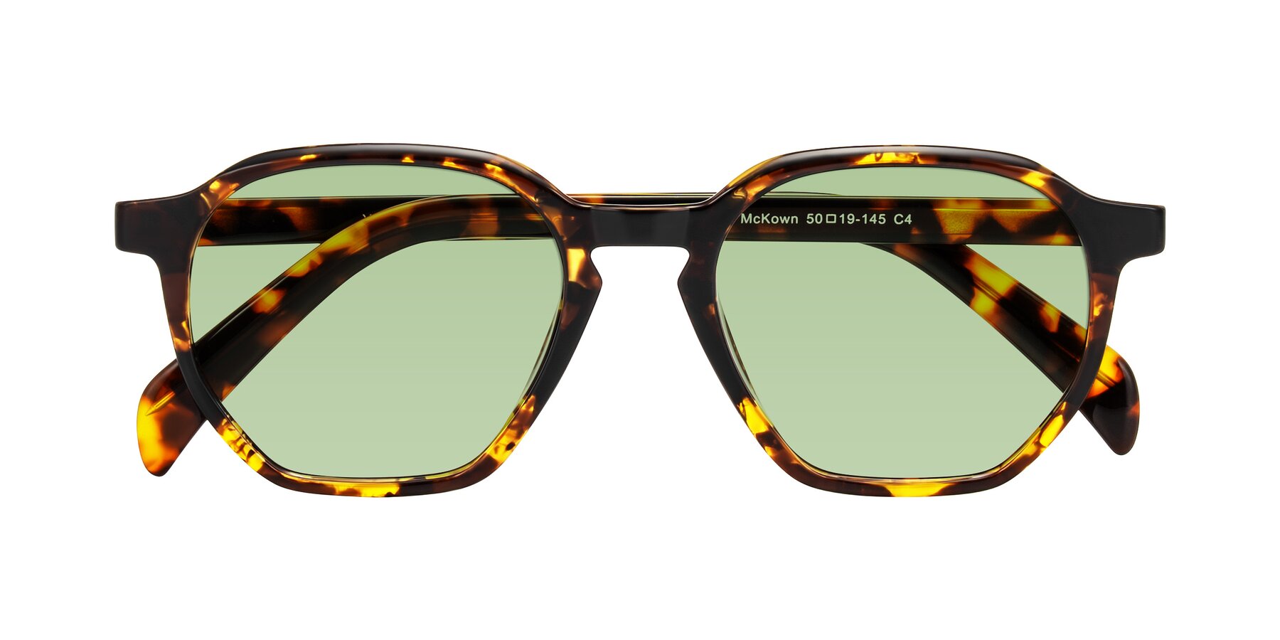 Folded Front of McKown in Tortise with Medium Green Tinted Lenses