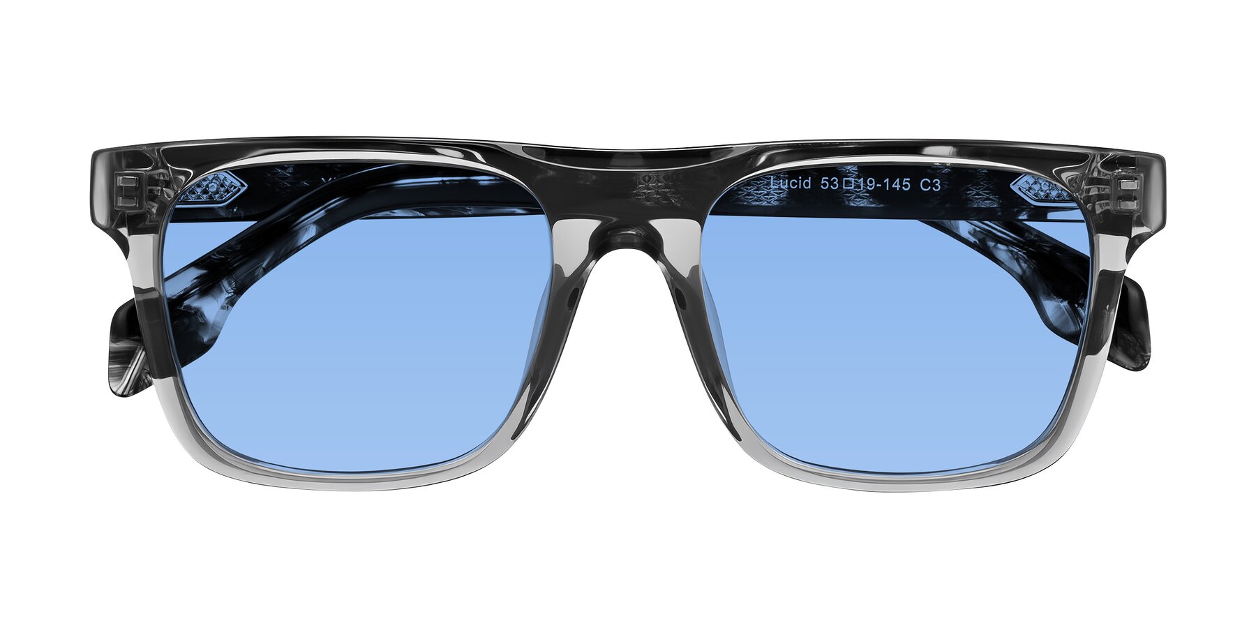 Folded Front of Lucid in Transparent Gray/Tortoise with Medium Blue Tinted Lenses
