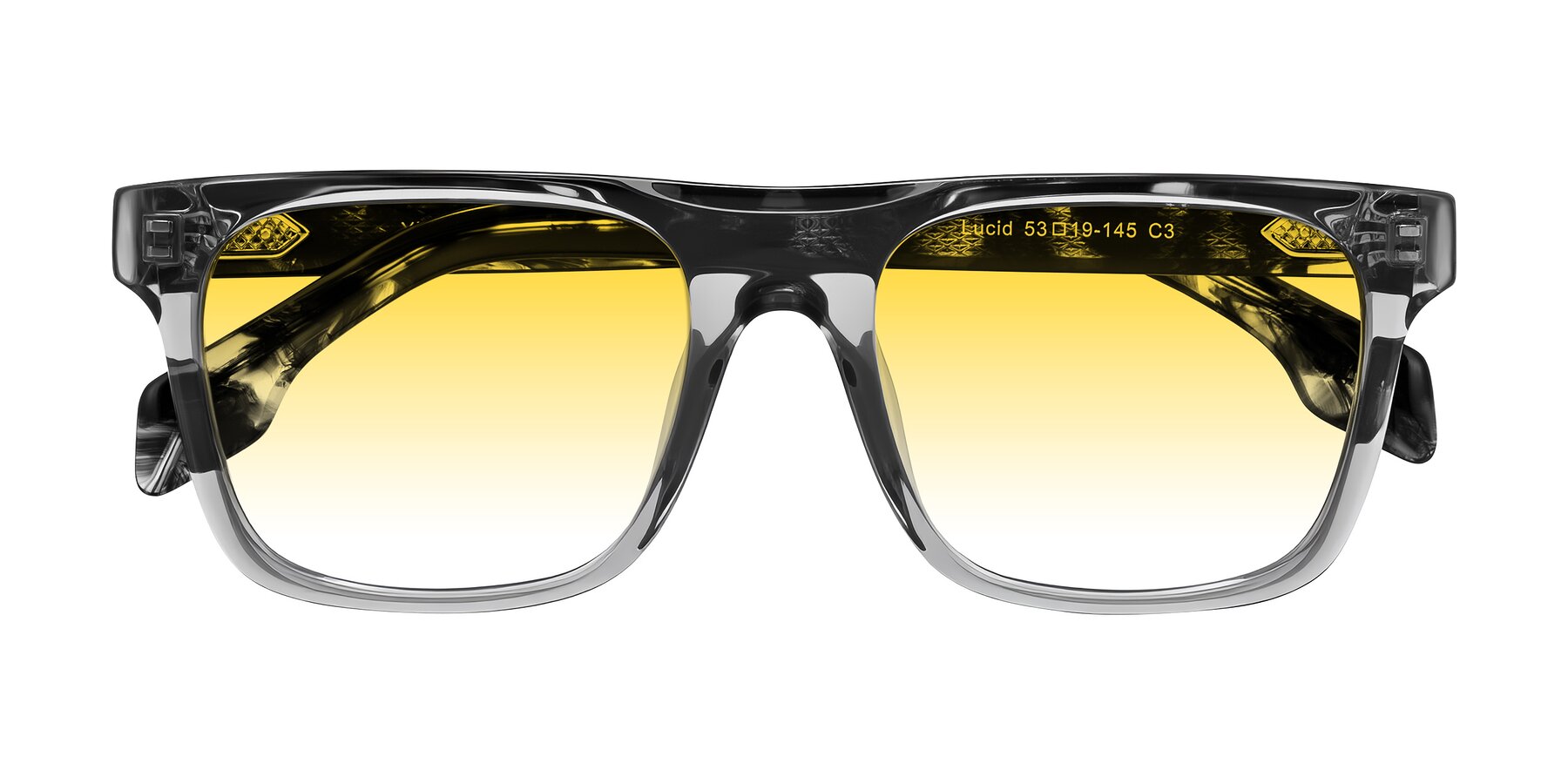 Folded Front of Lucid in Transparent Gray/Tortoise with Yellow Gradient Lenses