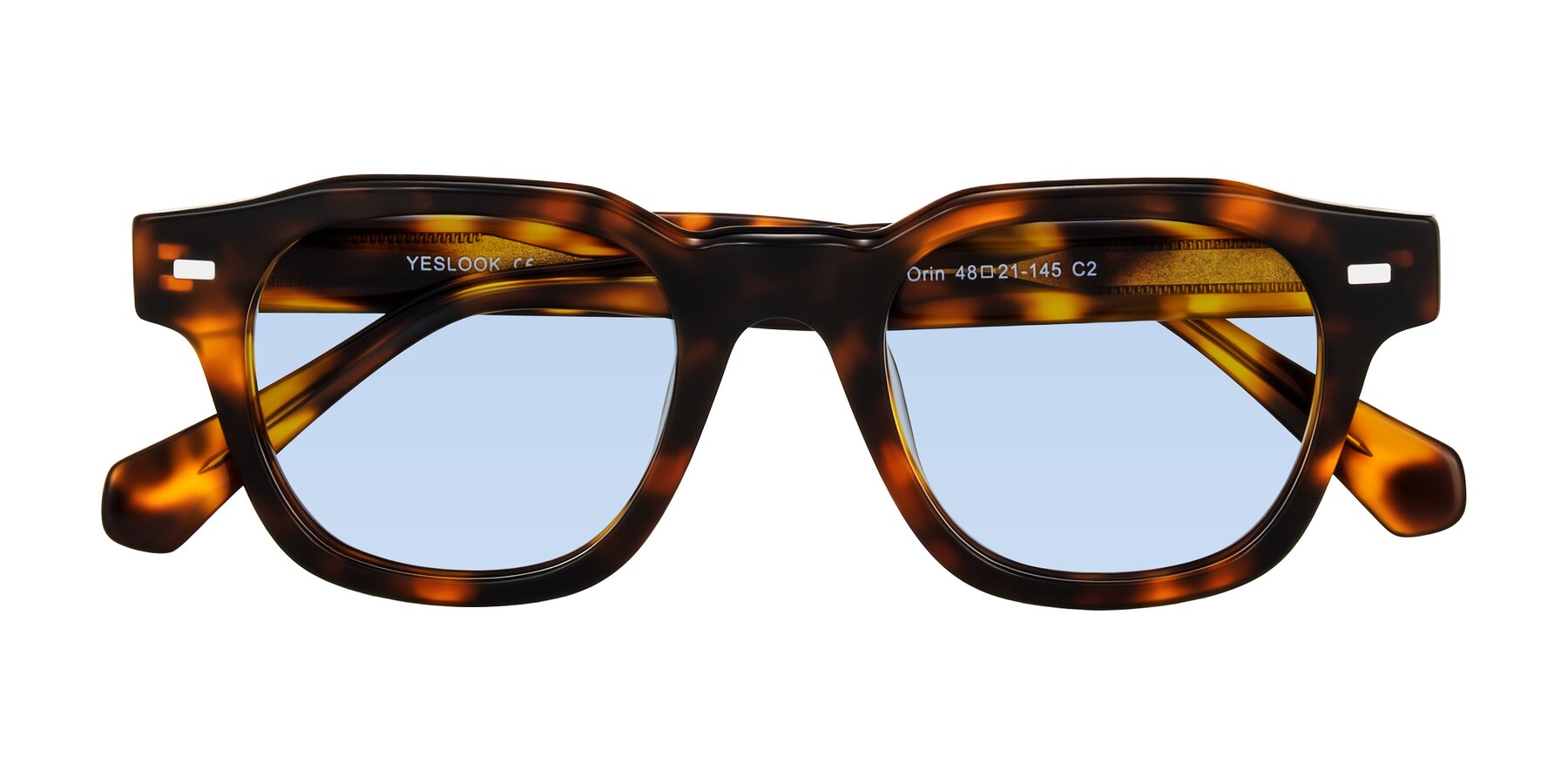 Folded Front of Orin in Tortoise with Light Blue Tinted Lenses