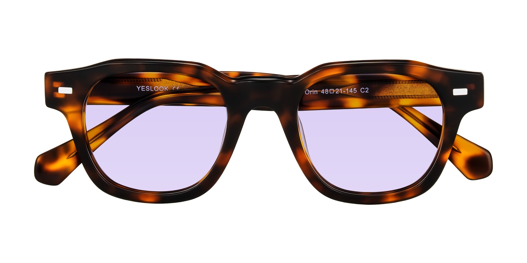 Folded Front of Orin in Tortoise with Light Purple Tinted Lenses