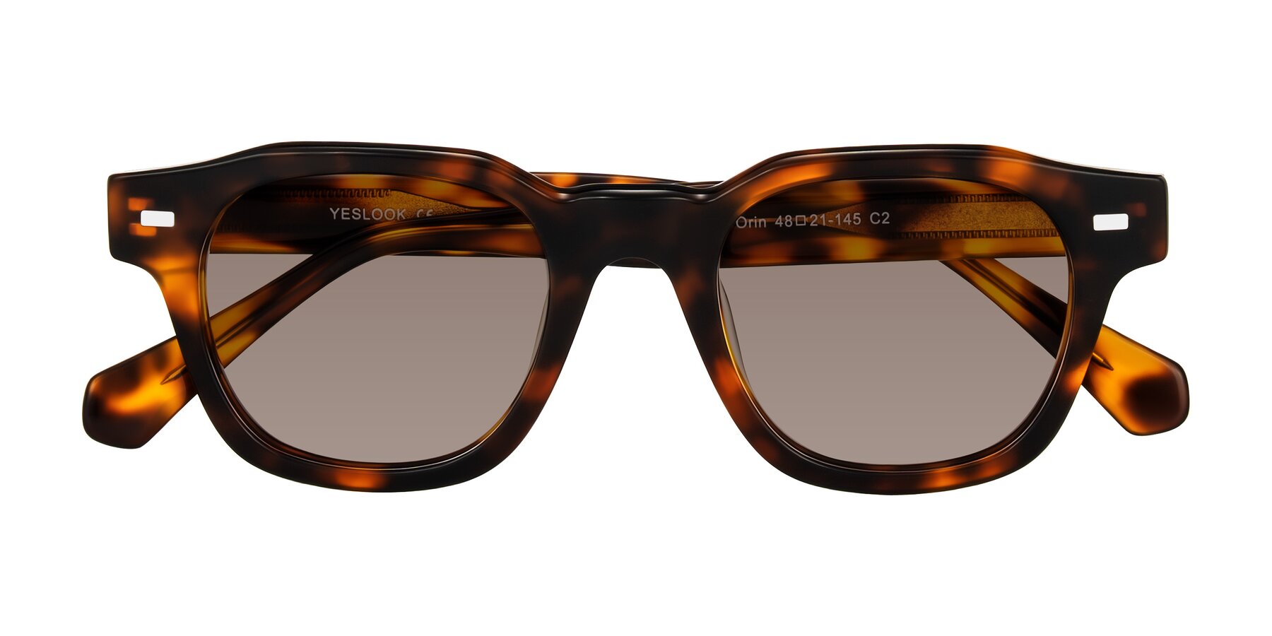 Folded Front of Orin in Tortoise with Medium Brown Tinted Lenses