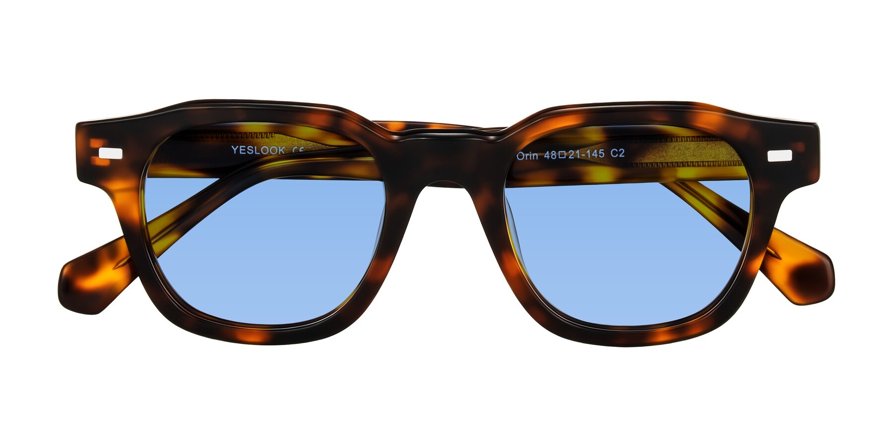 Folded Front of Orin in Tortoise with Medium Blue Tinted Lenses
