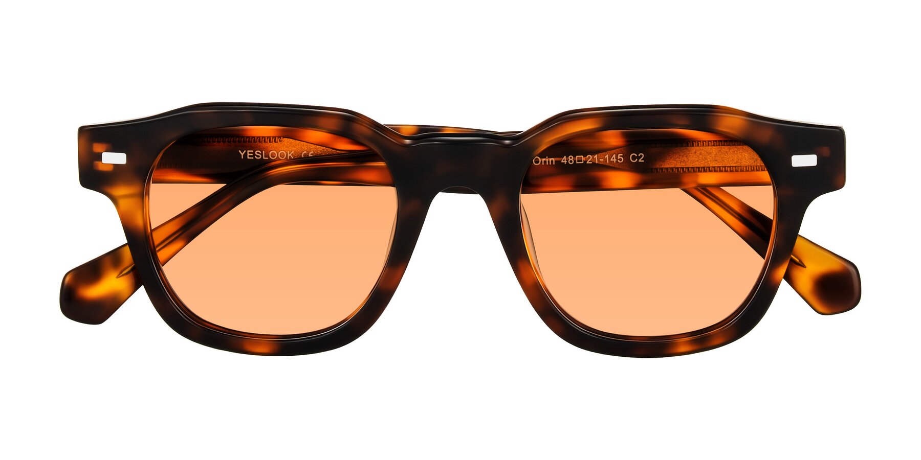 Folded Front of Orin in Tortoise with Medium Orange Tinted Lenses